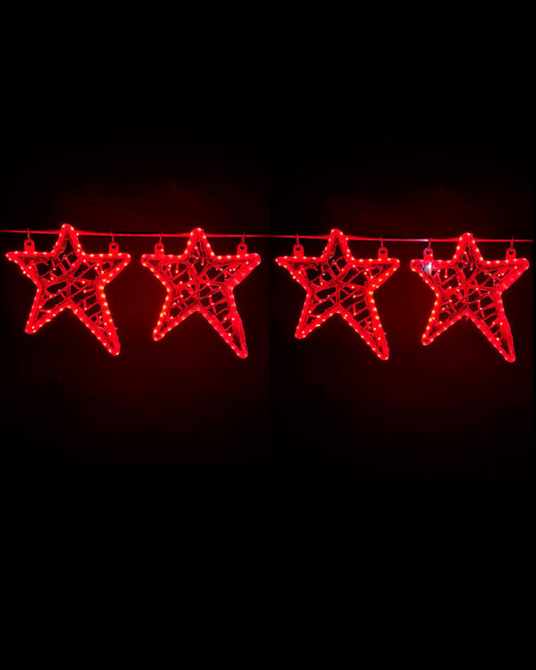 Røde LED-stjernemotiver hængt på række mod sort baggrund, hvor de klare lys fremhæver form og struktur, ideelle til juleudsmykning, facader og professionelle dekorative installationer.
