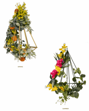 Geometriske ophæng dekoreret med kunstige blomster i forårs- og sommerfarver, kombinerer grønne blade og farverige blomster, ideelle til sæsonbaseret dekoration i moderne indretninger.
