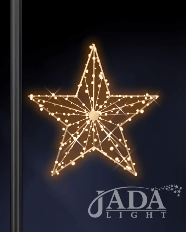 2D-stjerneformet lygtepælsmotiv med varm hvid LED og glitrende lysprikker, vist på mørk blå baggrund som elegant produktbillede til professionel juleudsmykning.