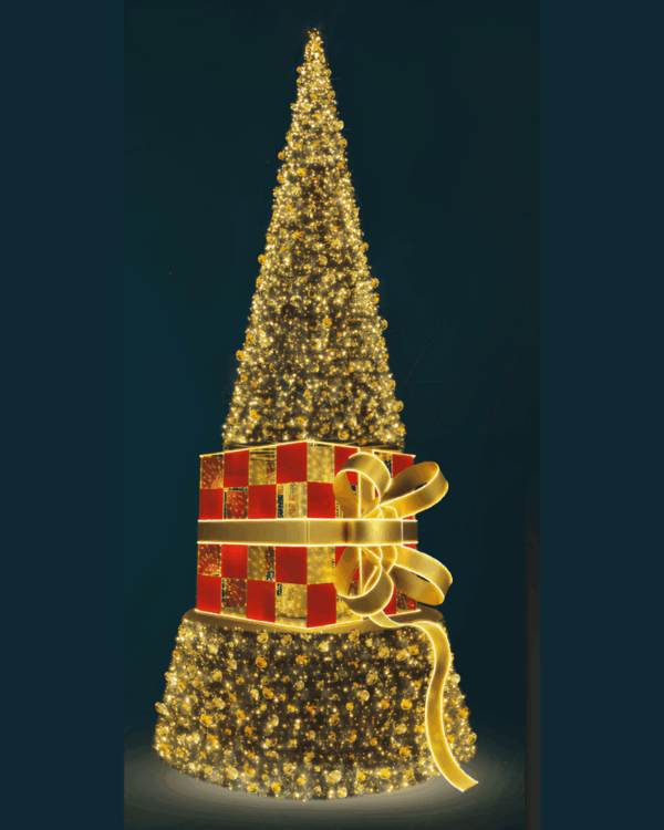 Kunstigt juletræ med gavemotiv i midten i varm hvid med julekugler på sort baggrund.